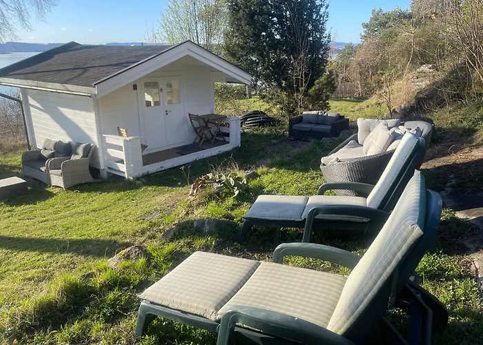 Nice Apartment With1 Bedroom Separate Living Room With A Sofa Bed And A Tiny Kitchen A Bathroom Located In Nordstrand Near By The Sea For 3 Guests With A Garden And Grill 5 Extra Guests With Extra Cost In The Cabin With Sea View Just Outside The Apar