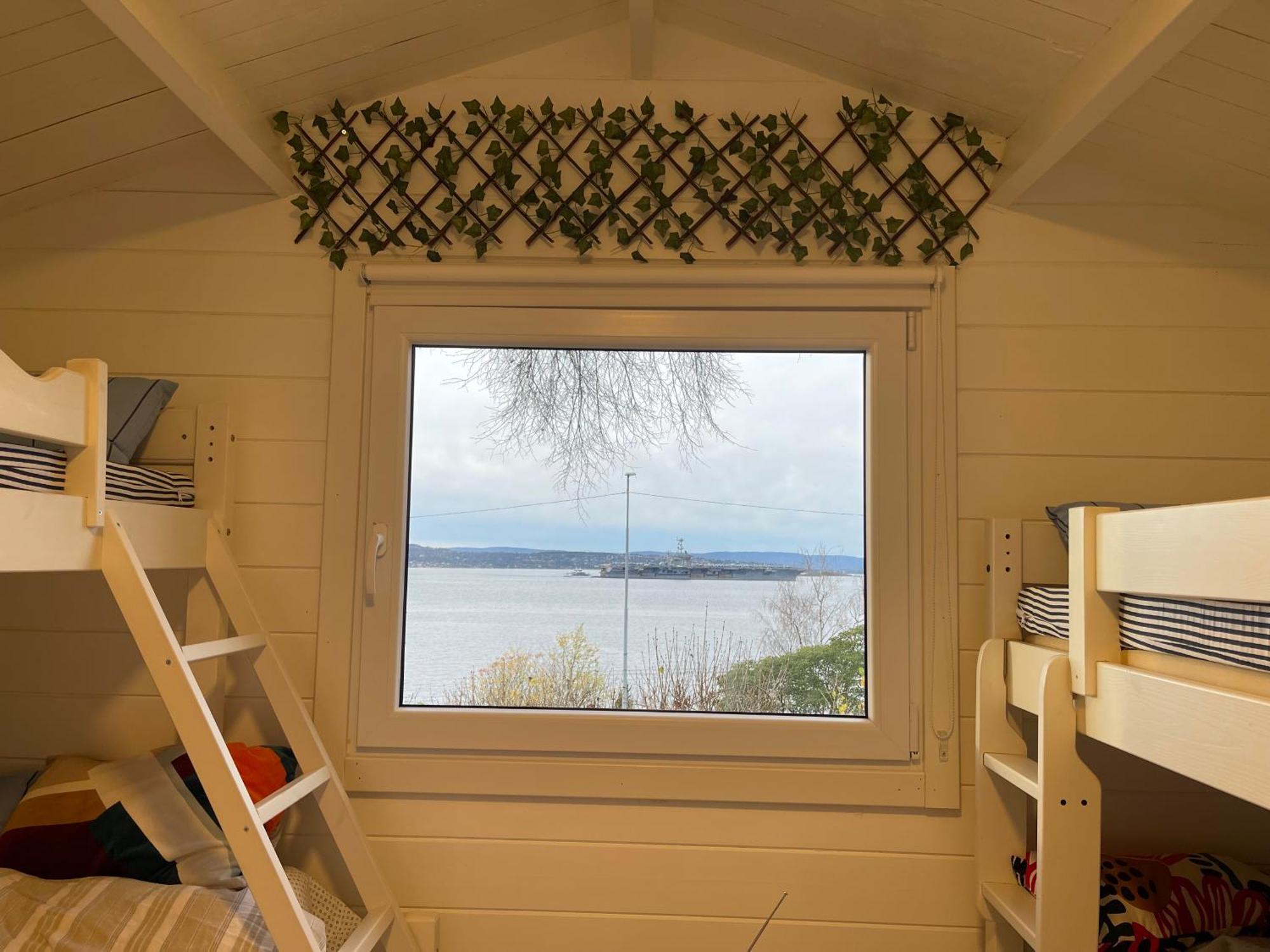 With1 Bedroom Separate Living With A Sofa Bed And A Tiny Kitchen A Bathroom Located In Nordstrand Near By The Sea For 3 Guests With A Garden And Grill 5 Extra Guests With Extra Cost In The With Sea View Just Outside The Apar